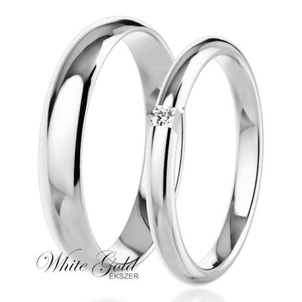 feher-arany-karikagyuru (123) Fehér arany karikagyűrű pár középen foglalt kővel