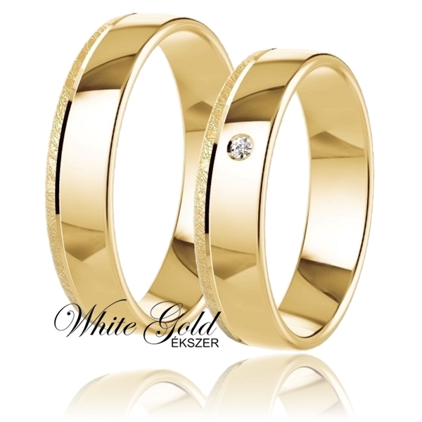 sarga_arany_karikagyuru_95 Sárga arany karikagyűrű pár jégkarc véséssel és egy kővel