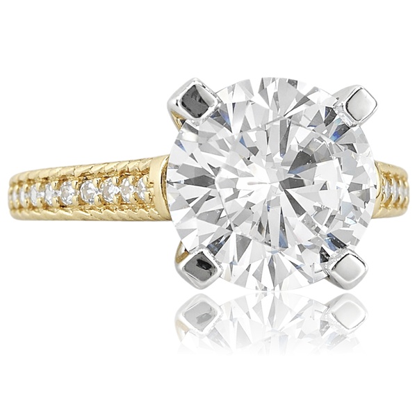 Sárga arany eljegyzési gyűrű nagy központi kővel